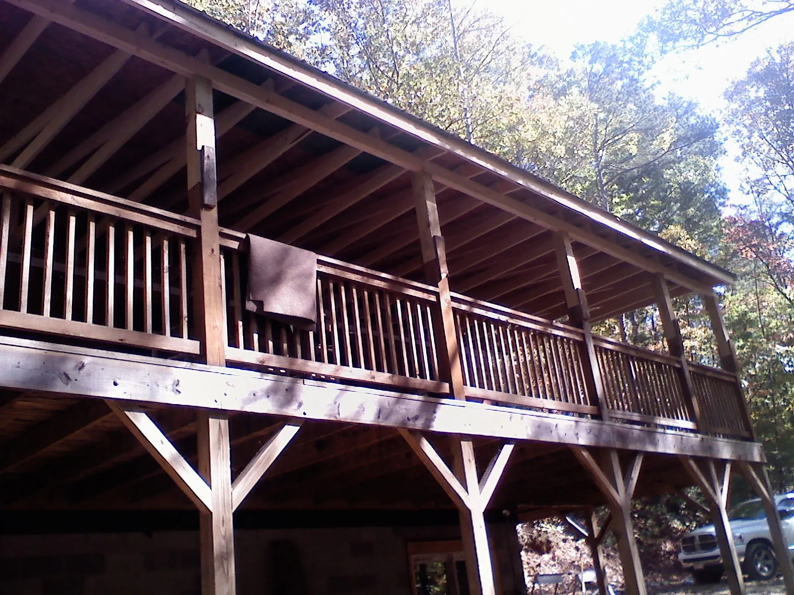 Timber framing under a new elevated porch and deck — Roof Leak Repair in Artois by Roofing Brothers